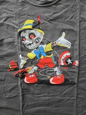 Robotic Pinocchio Graphic Tee — Black with Red, Yellow & Blue